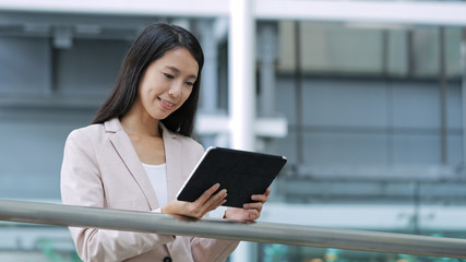 Business woman using tablet computer