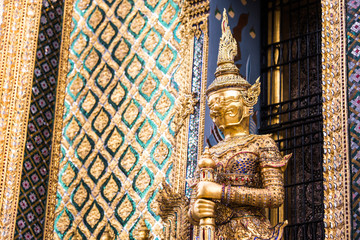 A statue of Yaksa on temple guard at the Temple of the Emerald Buddha, Bangkok, Thailand