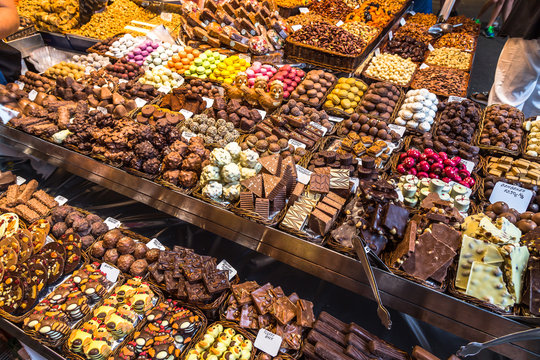 Variety of chocolates made from chocolate ready for sale in the market of La Boquería