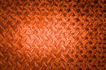 Red metal non slip surface background.