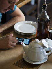 young Caucasian man writes in a social network