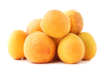 Ripe apricots isolated on white background