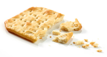 pieces and crumbs of cracker