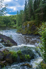 Fototapeta na wymiar At the waterfall Kivach, Karelia.