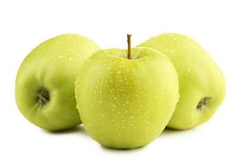 Green apples with water drops isolated on white background