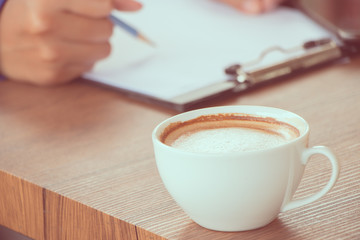 coffee with hand writing