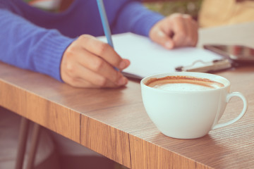 coffee with hand writing