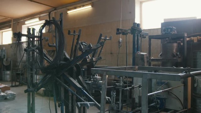 Old scratched soviet plant for producing of fiberglass reinforcement