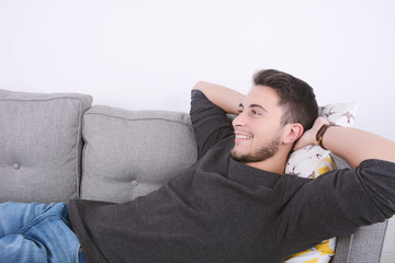 Obraz premium Man lying on couch.