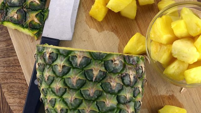 Fresh made Sliced Pineapple (rotating) as seamless loopable 4K UHD footage)