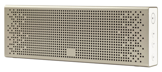 Metallic bluetooth speaker isolated on white background.