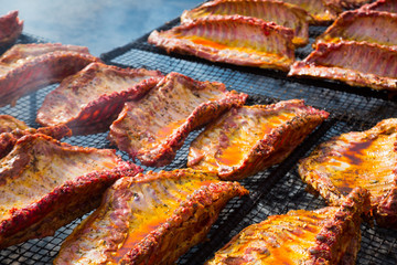 Obraz na płótnie Canvas Meat ribs of pig roasting on barbecue