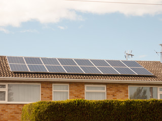 close up of solar panels on top of roof home