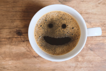 Coffee with smiley face in the morning.