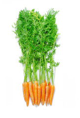 Fresh carrots with leaves isolated on white background
