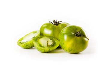 green tomatoes on white background