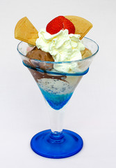 Ice Cream In The Cup with whip cream on White Background. Selective focus.