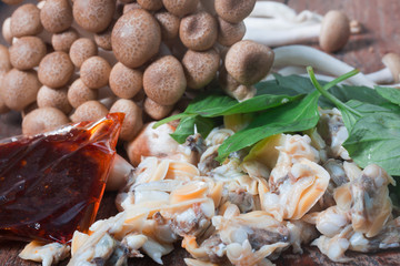 Fresh cockle From the sea of Thailand and  Shimichi mushrooms Before cooking 
