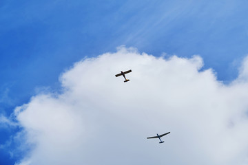 two planes, crossing the cloud vignette