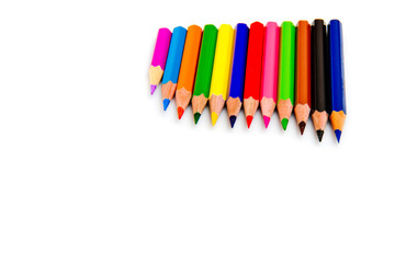Fototapeta premium Multicolored pencils isolated on white background. School supplies.