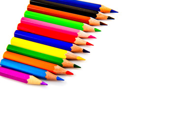 Multicolored pencils isolated on white background. School supplies.
