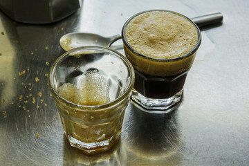 Two shot glasses of espresso coffee