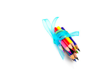 Obraz na płótnie Canvas Multicolored pencils isolated on white background. School supplies.