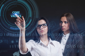 The concept of business, technology, the Internet and the network. A young entrepreneur working on a virtual screen of the future and sees the inscription: Core values