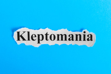 Kleptomania text on paper. Word Kleptomania on a piece of paper. Concept Image. Kleptomania Syndrome