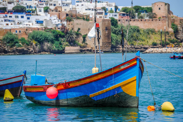 Fototapeta na wymiar Boats at the shore in the river of Rabat, Morocco
