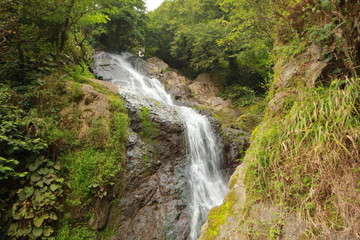 Fototapeta na wymiar waterfall in the mountains of Georgia
