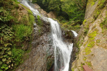 Fototapeta na wymiar waterfall in the mountains of Georgia
