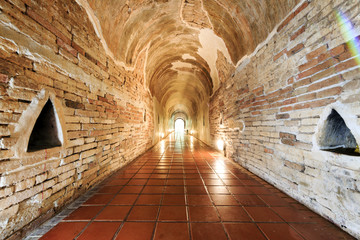 Walkway in the tunnel at Wat Au Mong, Chiang Mai, Thailand.