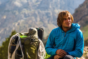 hiker relaxing with a backpack