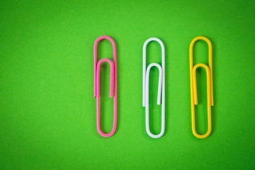 Close up of paper clips on paper