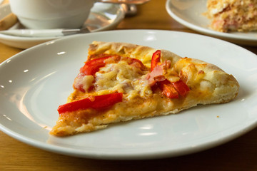 Pizza on white plate.