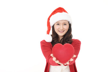 サンタ帽を被った笑顔の女性