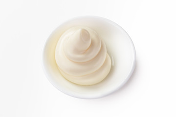 mayonnaise in a dish isolated white background