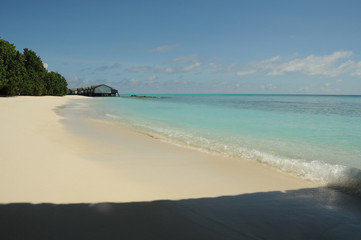 Deserted paradise island in the Maldives, beautiful white sand and crystal clear