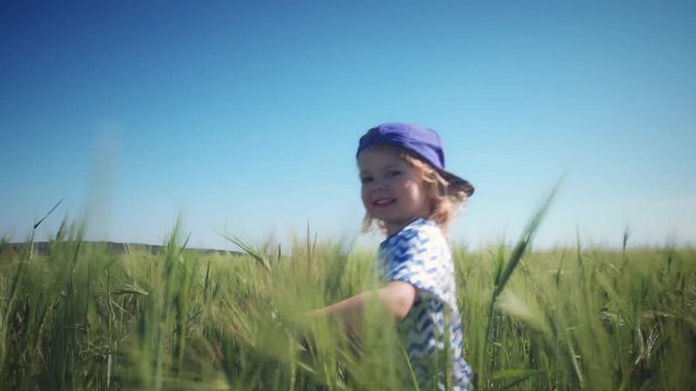 4k Happy Child Running in Wheat Fields