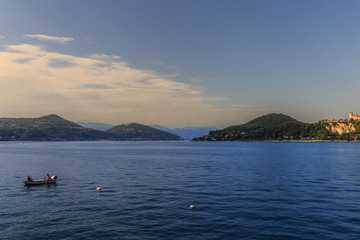Fototapeta na wymiar view of Lake Maggiore with mountain background in sunny afternoon