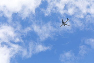 Fototapeta na wymiar Travel backround with a plane in the sky