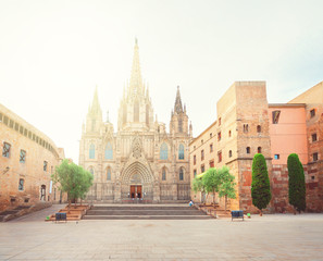 Naklejka na ściany i meble Square with cathedral church with sunlight in Gotic quarter of Barcelona, Spain