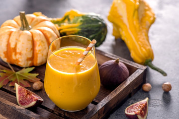 Healthy pumpkin smoothie, fresh vegan autumn drink