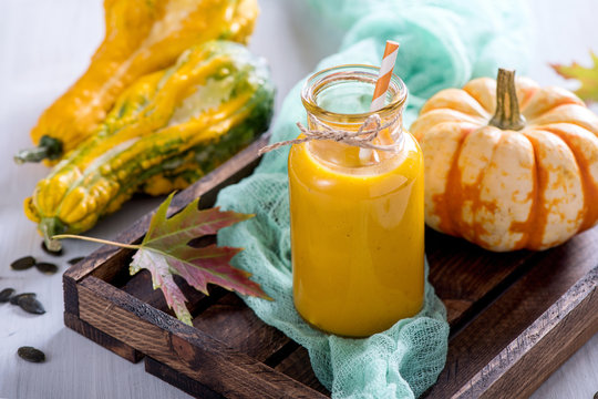 Healthy pumpkin smoothie, fresh vegan autumn drink