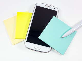 mobile phone covered in colorful blank post it notes