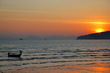 Krabi province, Thailand - September 2014: Amazing sunset on the thai beach