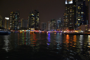Dubai, UAE - March 2014: Night walking in Dubai marina
