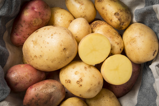 fresh raw potatoes close up - the detail