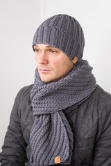 portrait of young man in winter landscape